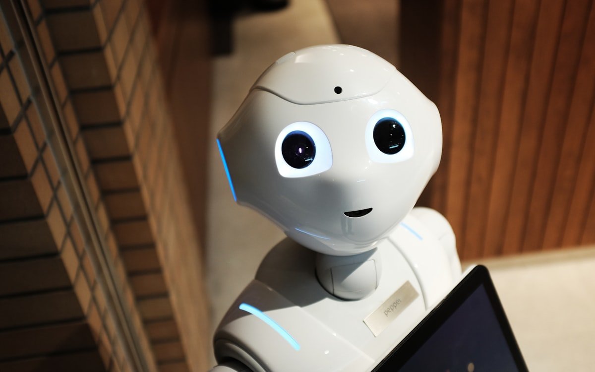 AI robot and technology representing ways to earn money online with AI