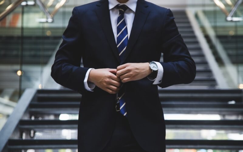 Professional workers in modern office discussing career growth