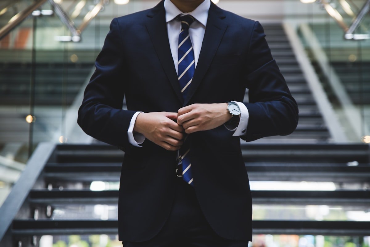 Professional workers in modern office discussing career growth