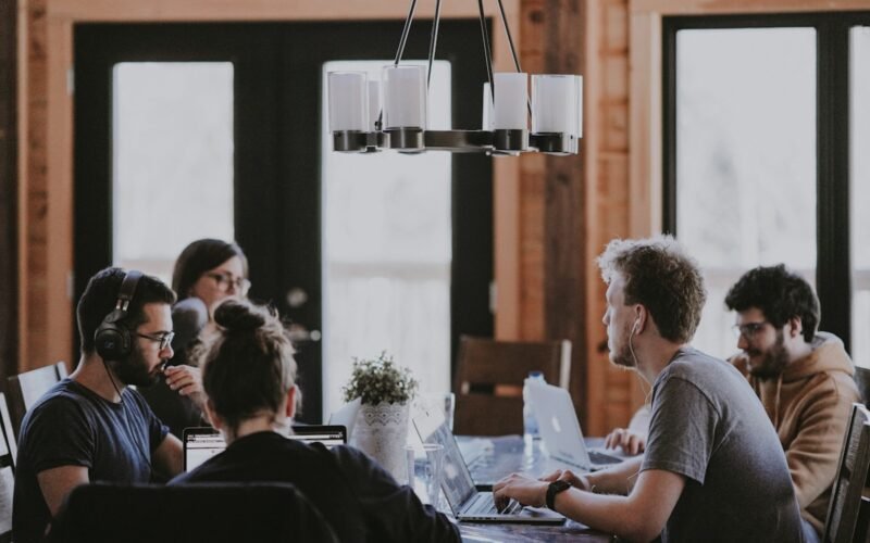 Diverse professional team collaborating in modern workplace