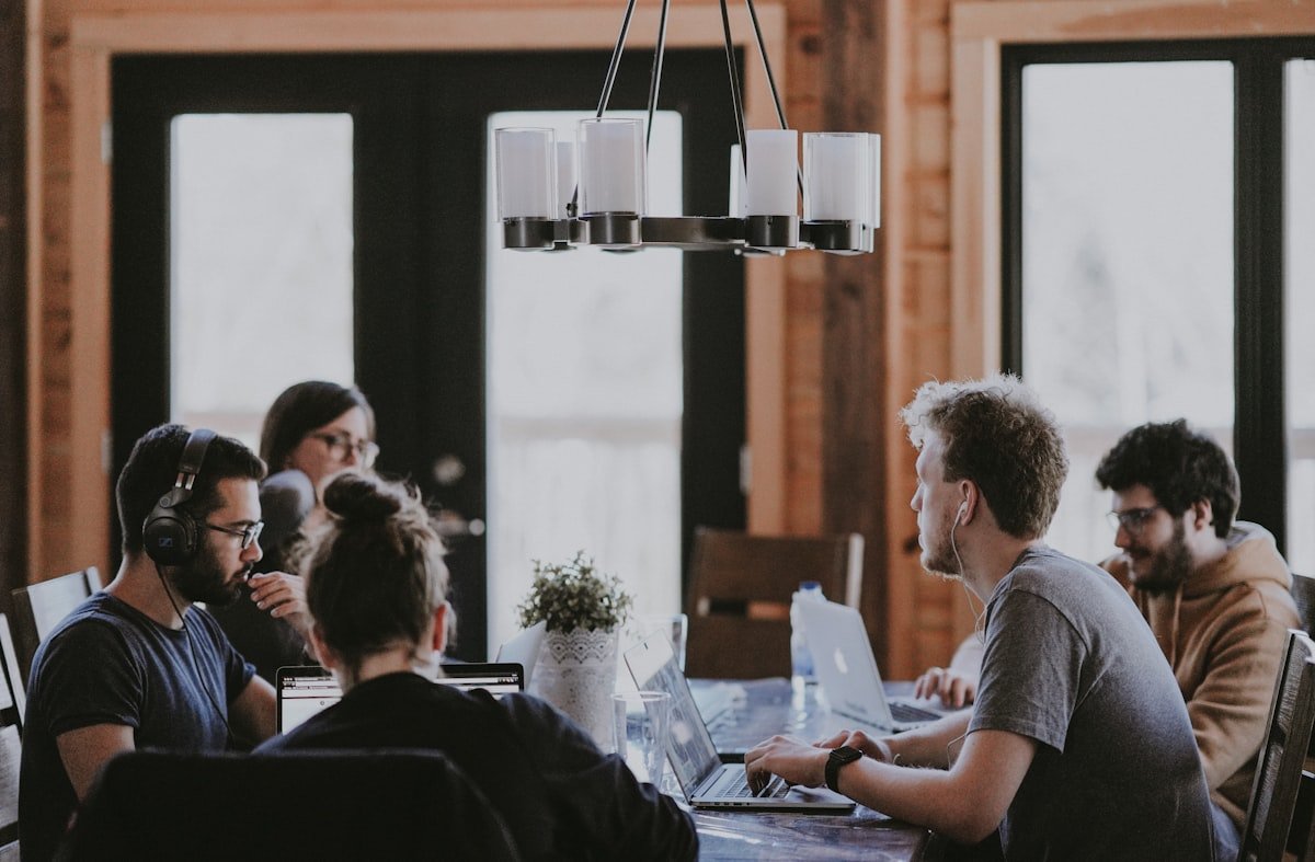 Diverse professional team collaborating in modern workplace