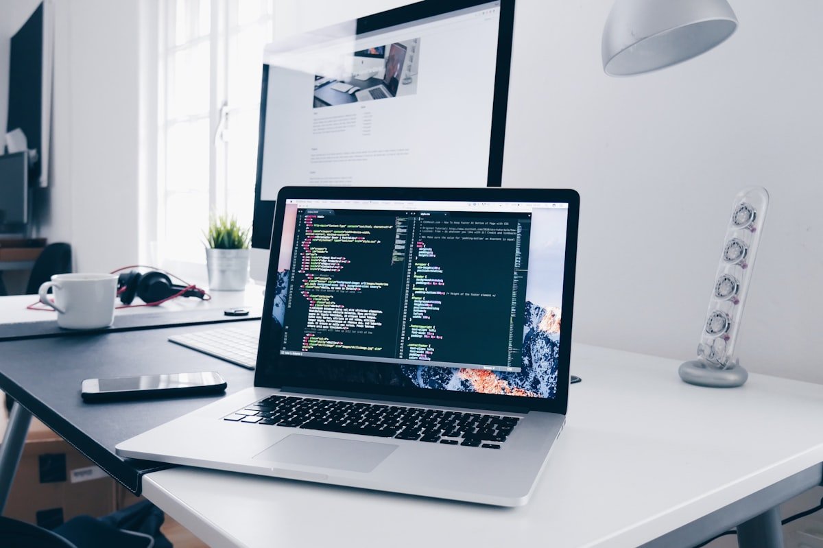 Laptop with sales charts and pipeline dashboard