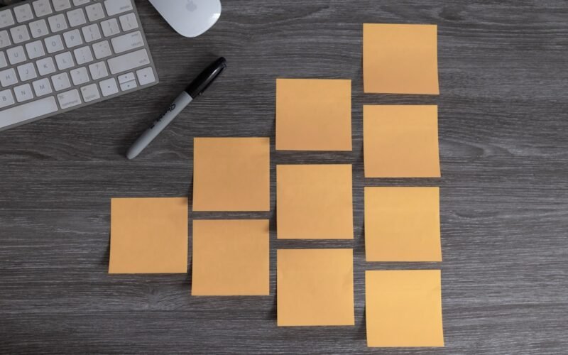 Amazon FBA shipping boxes with AI tools dashboard for making money online