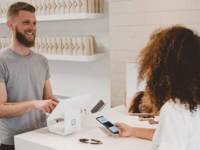 Person managing online store and dropshipping business on laptop