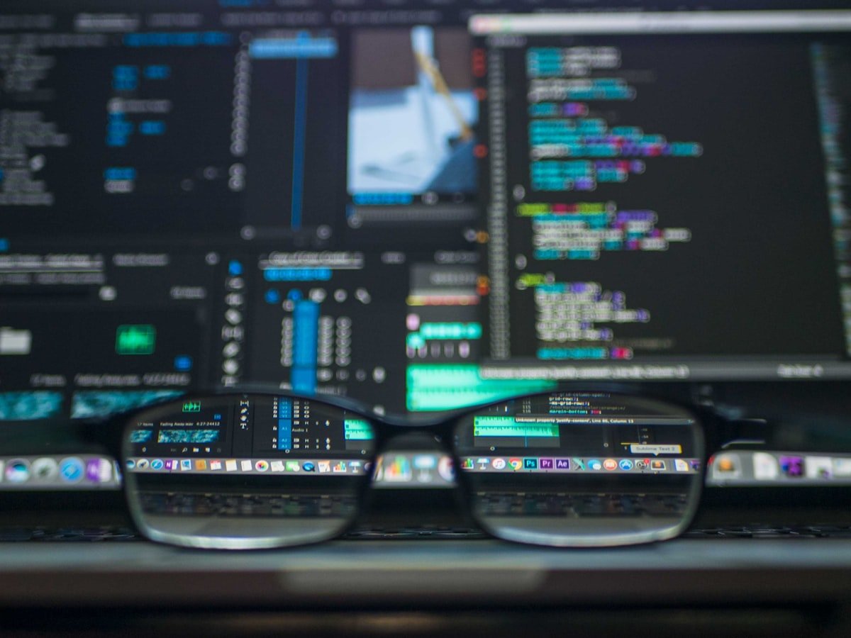 Data science workspace with code, charts, and neural network diagram