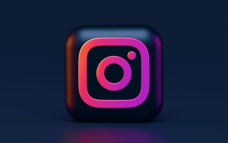 Person creating Instagram content with smartphone and product flat lay