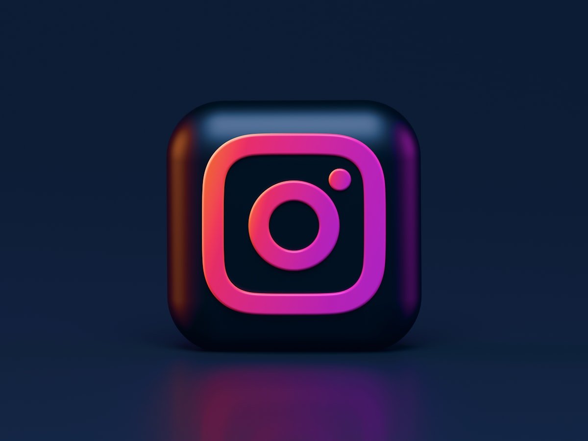 Person creating Instagram content with smartphone and product flat lay