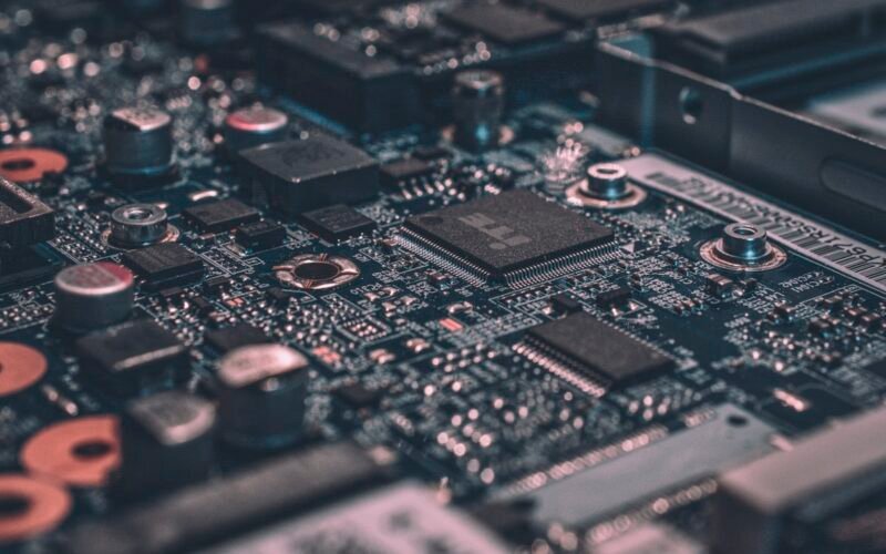 Futuristic circuit board and neural network visualization